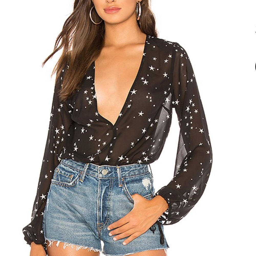 Revolve black star bodysuit size XS never worn